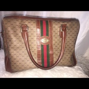 Authentic Gucci barrel handbag.